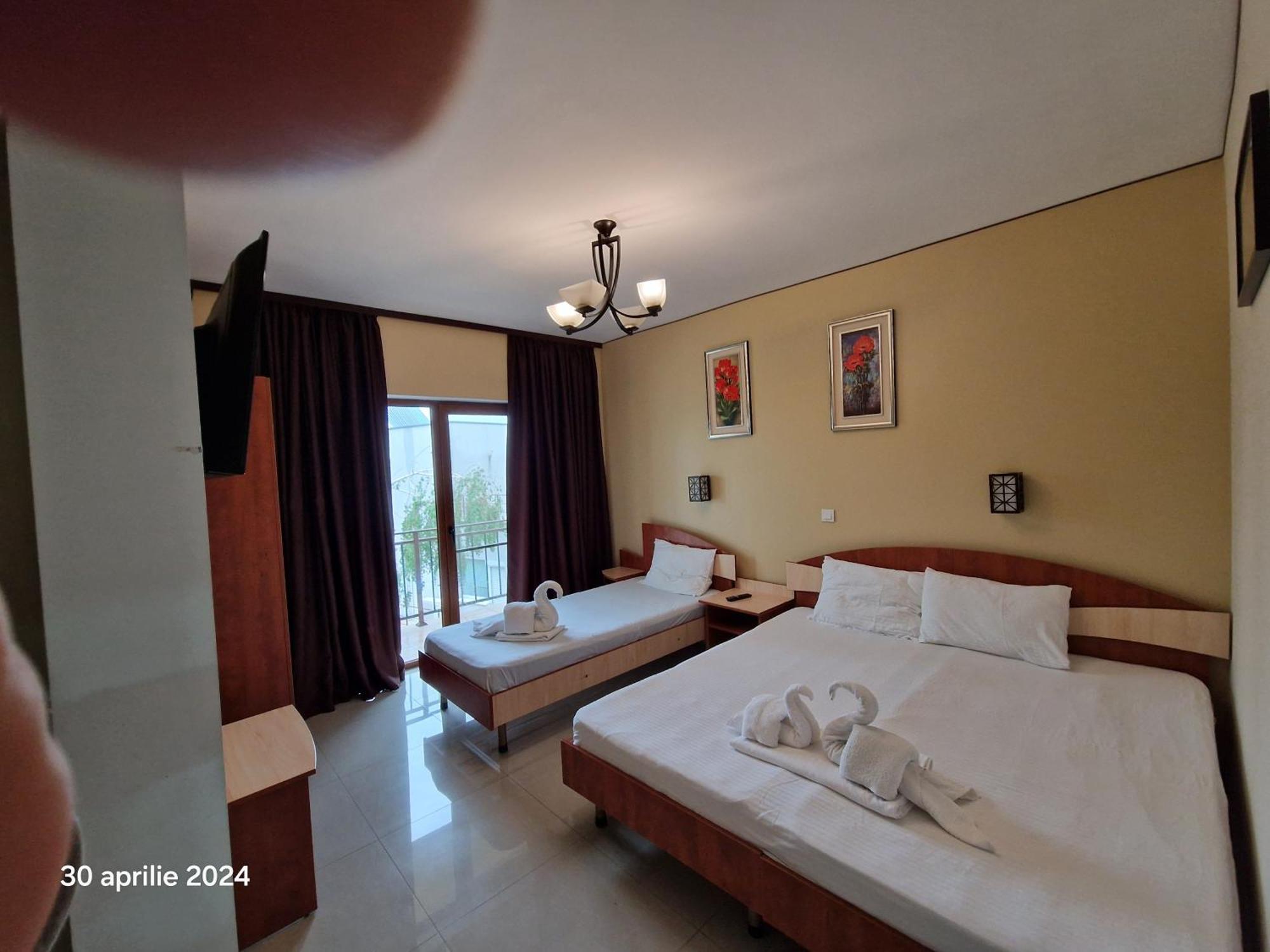 Апартаменты Casa Adrian Доуэ-Май Номер фото